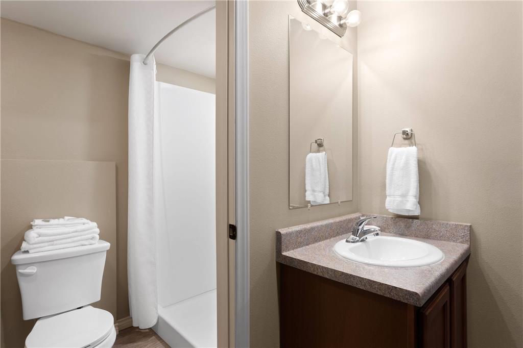 Eagle'S Den Suites Andrews A Travelodge By Wyndham Chambre photo